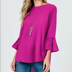 Solid woven top with ruffle sleeves